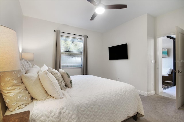 bedroom with light colored carpet and ceiling fan