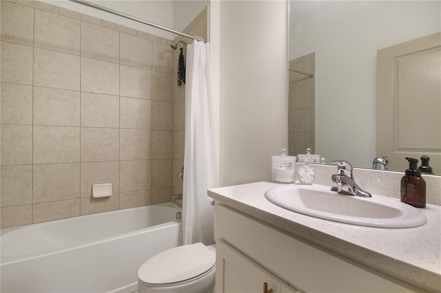 full bathroom with vanity, shower / bath combination with curtain, and toilet