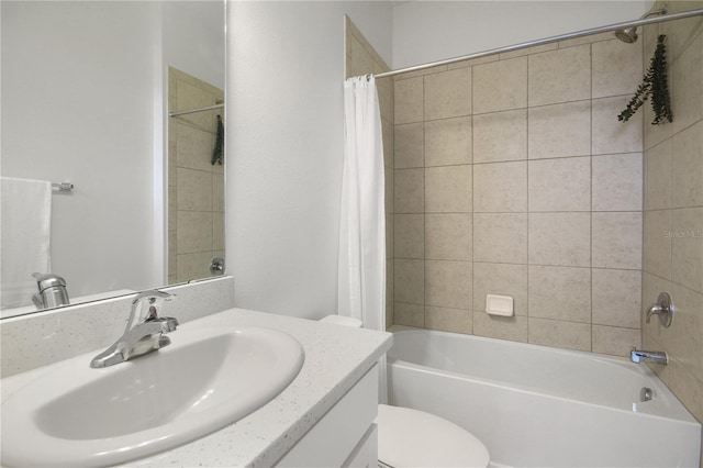 full bathroom featuring vanity, toilet, and shower / bath combo with shower curtain