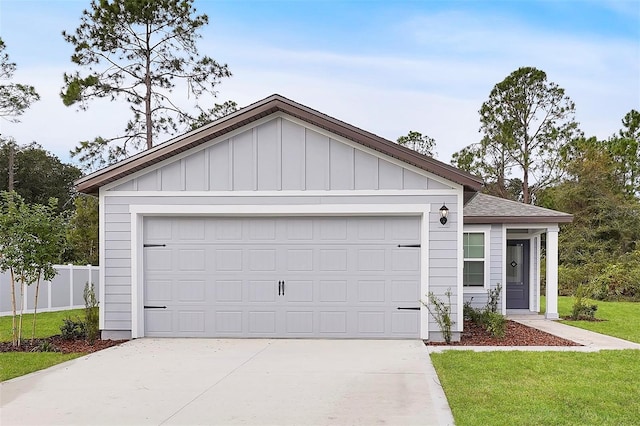 ranch-style home featuring a garage and a front lawn