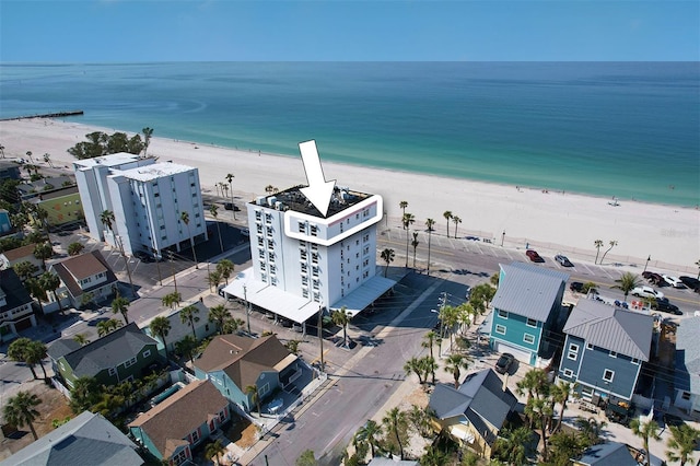 bird's eye view with a beach view and a water view