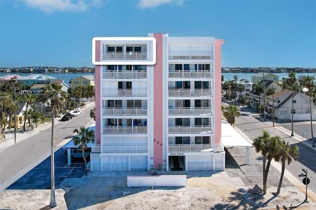 view of building exterior with a water view