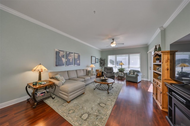 living room featuring dark hardwood / wood-style flooring, crown molding, and ceiling fan