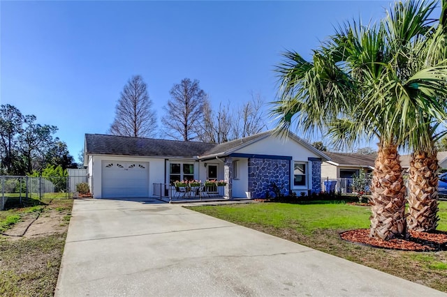 single story home featuring a garage and a front lawn