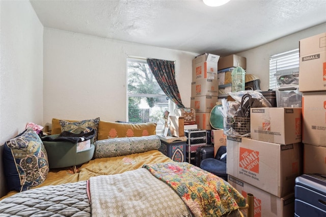 bedroom featuring a textured ceiling