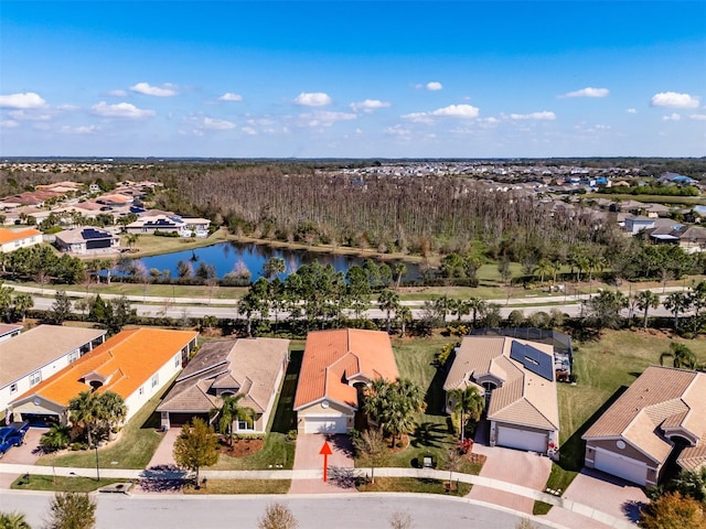 aerial view with a water view and a residential view