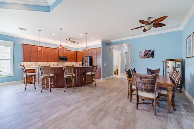 dining area with baseboards, visible vents, a ceiling fan, crown molding, and recessed lighting