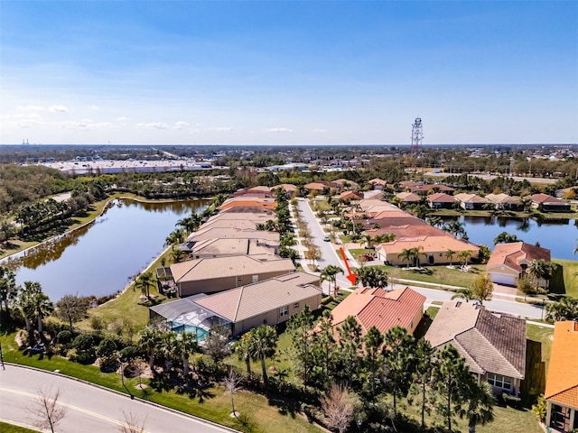 aerial view featuring a water view and a residential view