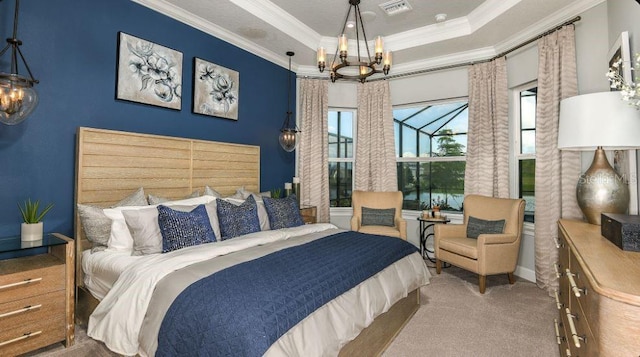 carpeted bedroom featuring a raised ceiling, crown molding, and a chandelier