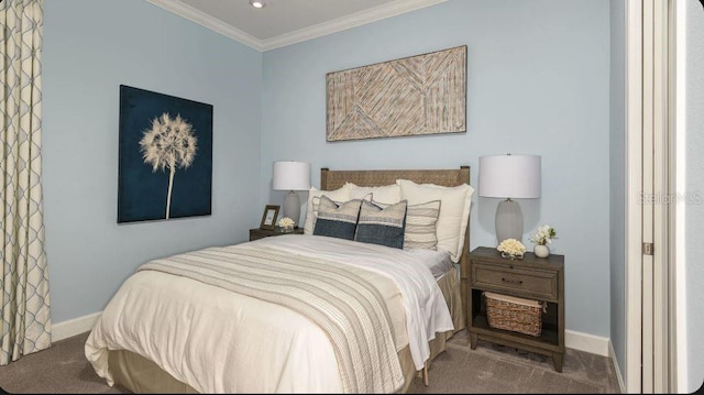 carpeted bedroom featuring crown molding