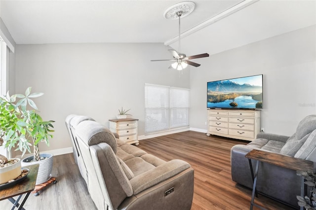 living room featuring ceiling fan, dark wood-type flooring, and lofted ceiling with beams