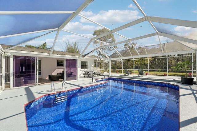 view of pool featuring a patio and a lanai