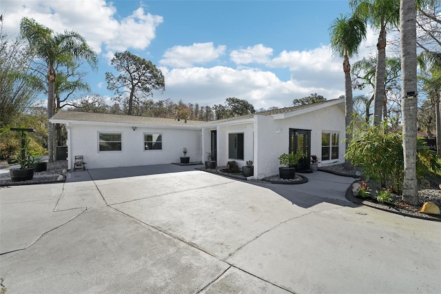 rear view of property with a patio area