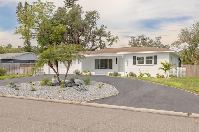 ranch-style house with a garage