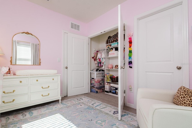 bedroom with light carpet