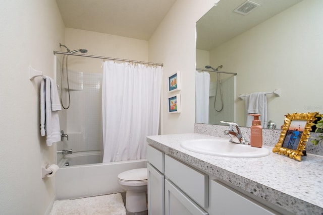 full bathroom featuring vanity, toilet, and shower / bath combo with shower curtain