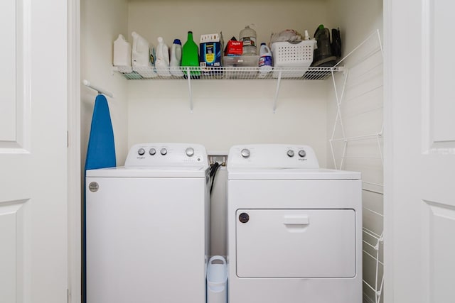 washroom with washer and dryer