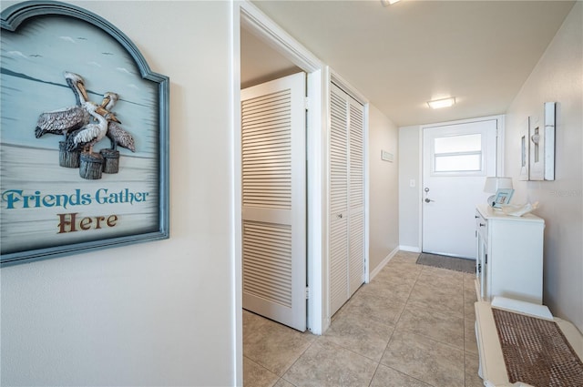 interior space featuring light tile patterned floors