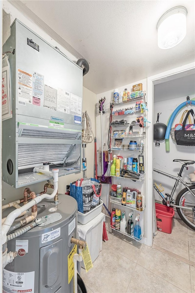 interior space featuring heating unit and water heater