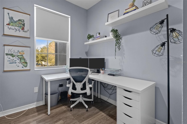 office space with hardwood / wood-style floors