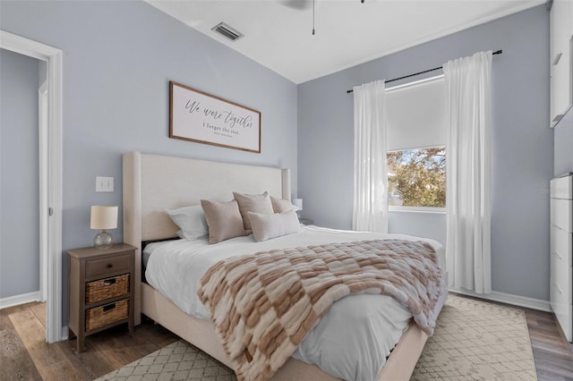 bedroom featuring hardwood / wood-style floors