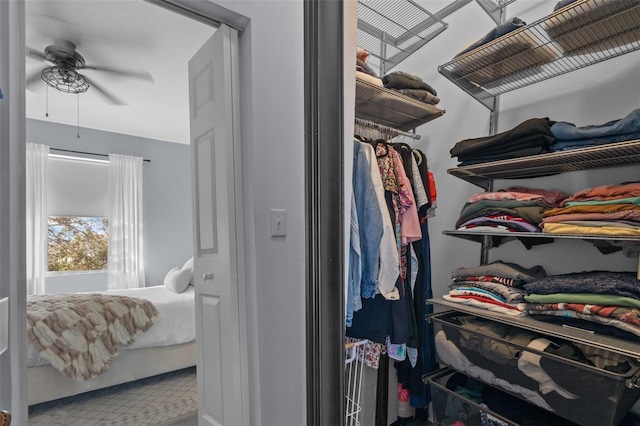 spacious closet featuring ceiling fan