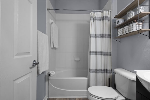 full bathroom with vanity, toilet, and shower / bath combo with shower curtain