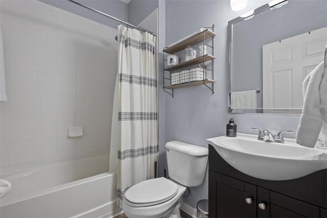 full bathroom with shower / bath combination with curtain, vanity, and toilet