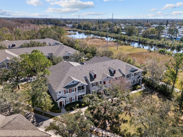 bird's eye view with a water view