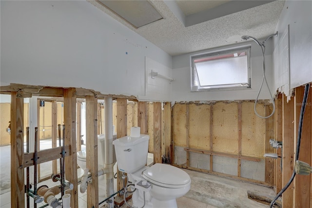 bathroom with a textured ceiling