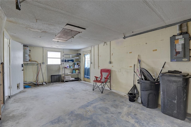 basement with electric panel and a textured ceiling