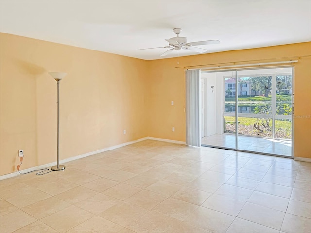 10346 Carrollwood Ln Unit 171, Tampa, FL 33618 - unfurnished room featuring light tile patterned floors, baseboards, and a ceiling fan