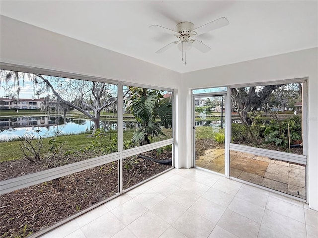 10346 Carrollwood Ln Unit 171, Tampa, FL 33618 - unfurnished sunroom featuring a wealth of natural light, a water view, and a ceiling fan