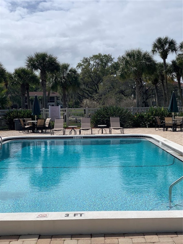 10346 Carrollwood Ln Unit 171, Tampa, FL 33618 - view of pool featuring a patio area and fence