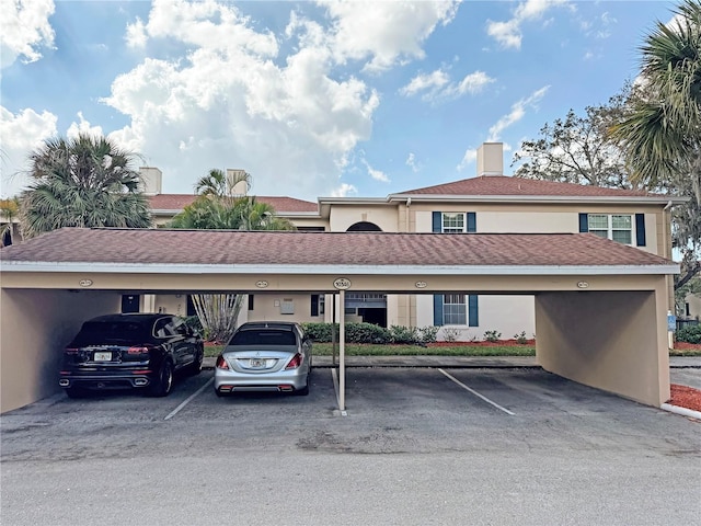10346 Carrollwood Ln Unit 171, Tampa, FL 33618 - view of covered parking lot