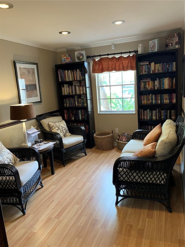 10346 Carrollwood Ln Unit 171, Tampa, FL 33618 - living area with crown molding, wood finished floors, and recessed lighting