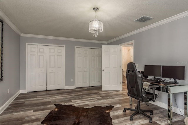 office with an inviting chandelier, crown molding, hardwood / wood-style floors, and a textured ceiling