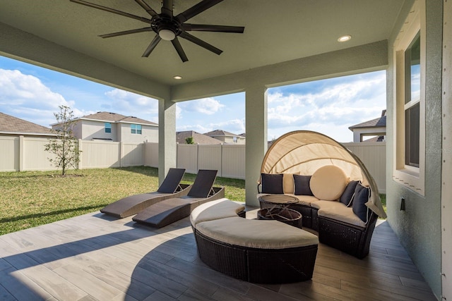 view of patio featuring ceiling fan and an outdoor living space