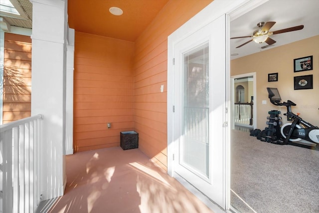 interior space featuring ceiling fan