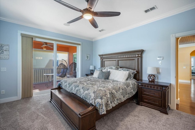 bedroom with light carpet, access to exterior, crown molding, and ceiling fan