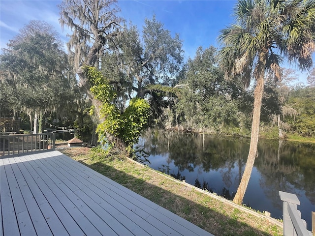 deck featuring a water view