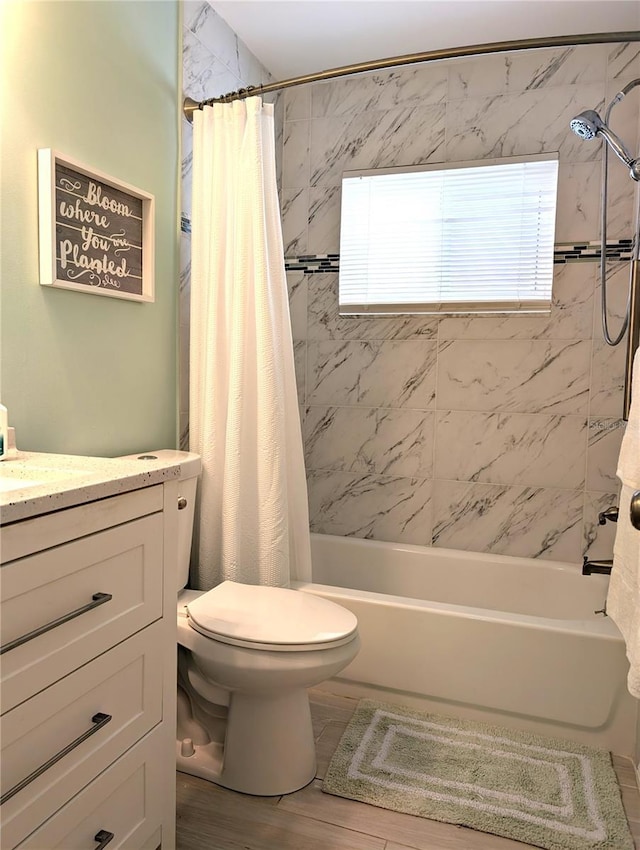 full bathroom with vanity, toilet, and shower / bathtub combination with curtain