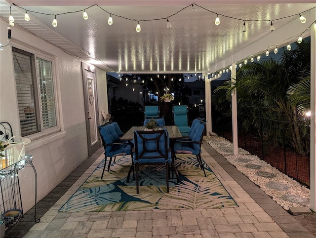 view of patio featuring outdoor dining area