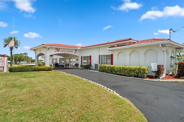 view of building exterior featuring driveway