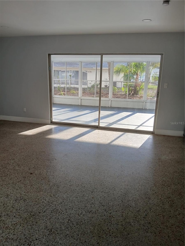 empty room featuring plenty of natural light