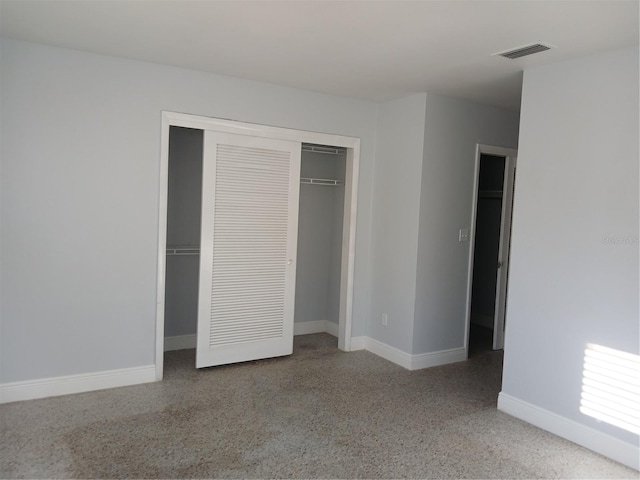 unfurnished bedroom featuring a closet