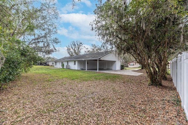 view of yard featuring a carport