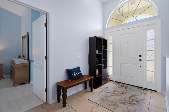 entrance foyer with light tile patterned floors