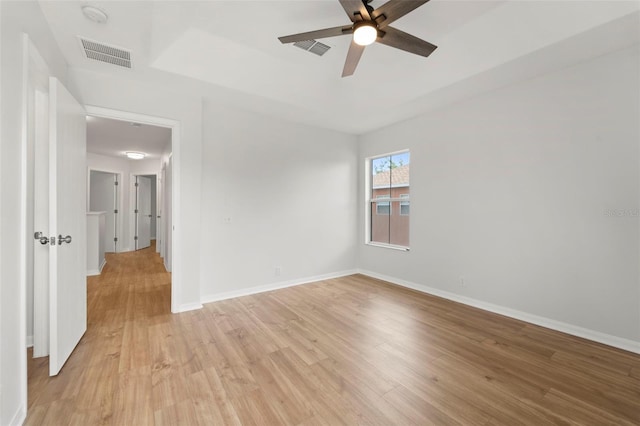 unfurnished room featuring light hardwood / wood-style flooring and ceiling fan