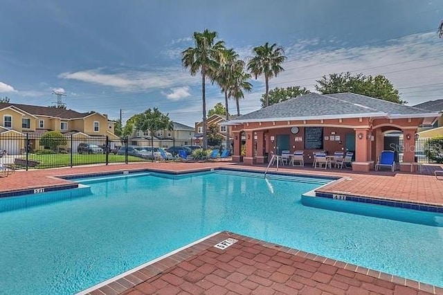 view of swimming pool featuring a patio area